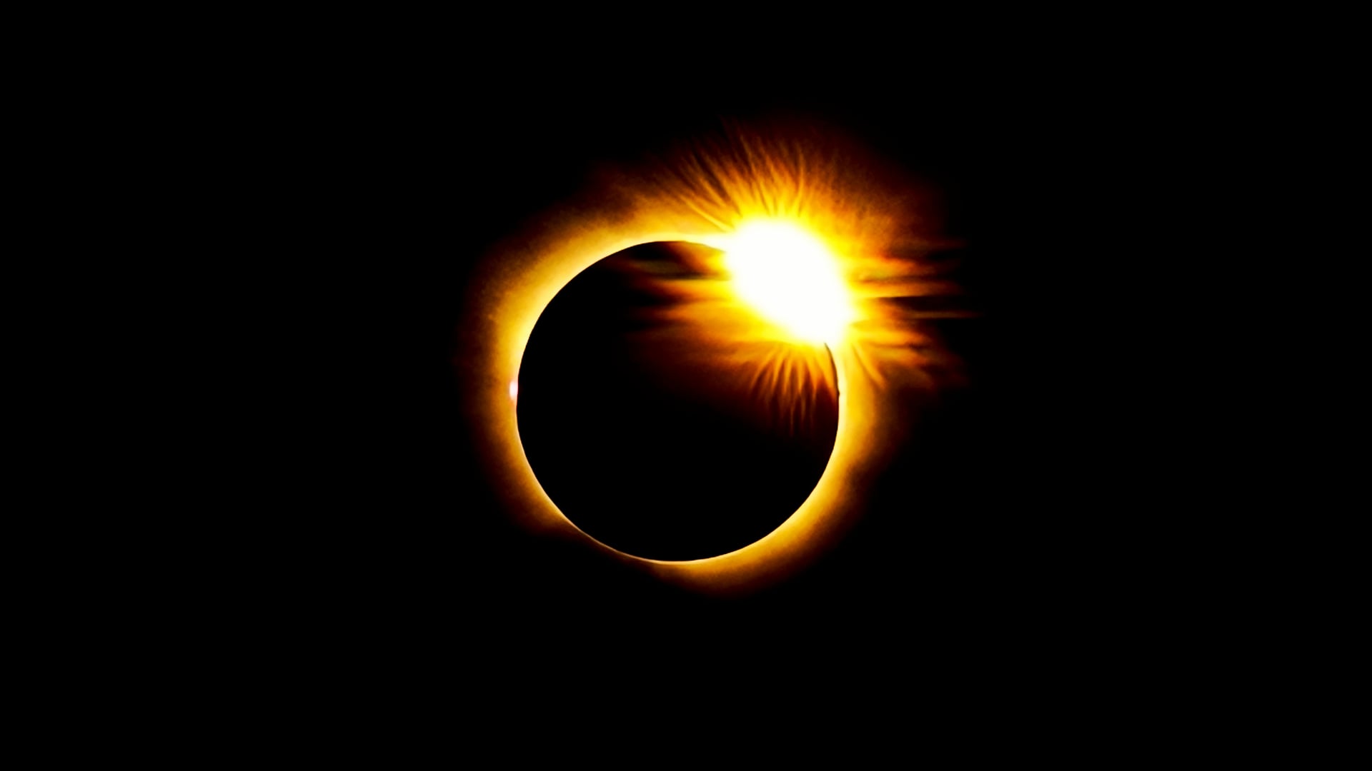 Silueta de la ría de Bilbao al atardecer con el Sol totalmente eclipsado y la corona solar visible sobre el horizonte